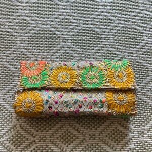 colorful flower and sequin clutch